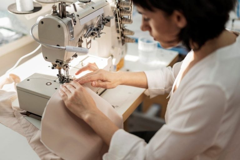 Woman Working With Sewing Machine