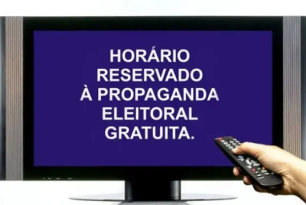 Horário Eleitoral Obrigatório sendo exibido em uma TV.