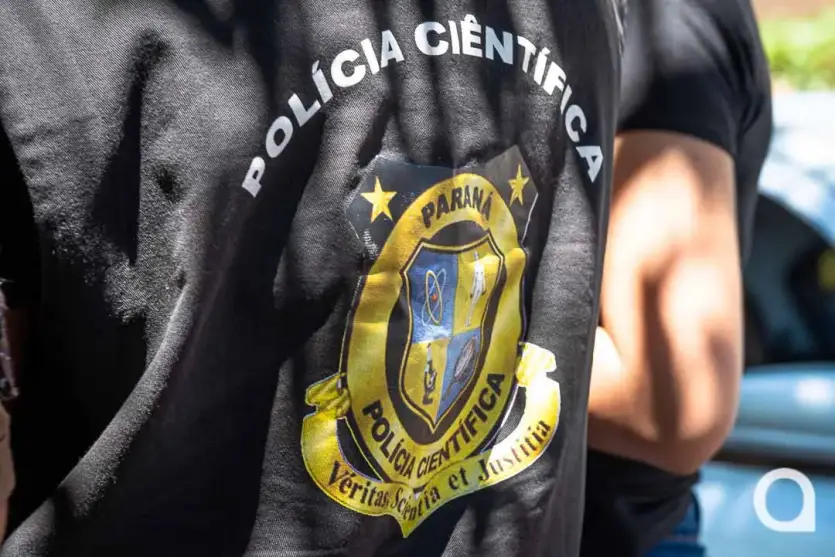 Trabalhador da Polícia Científica.